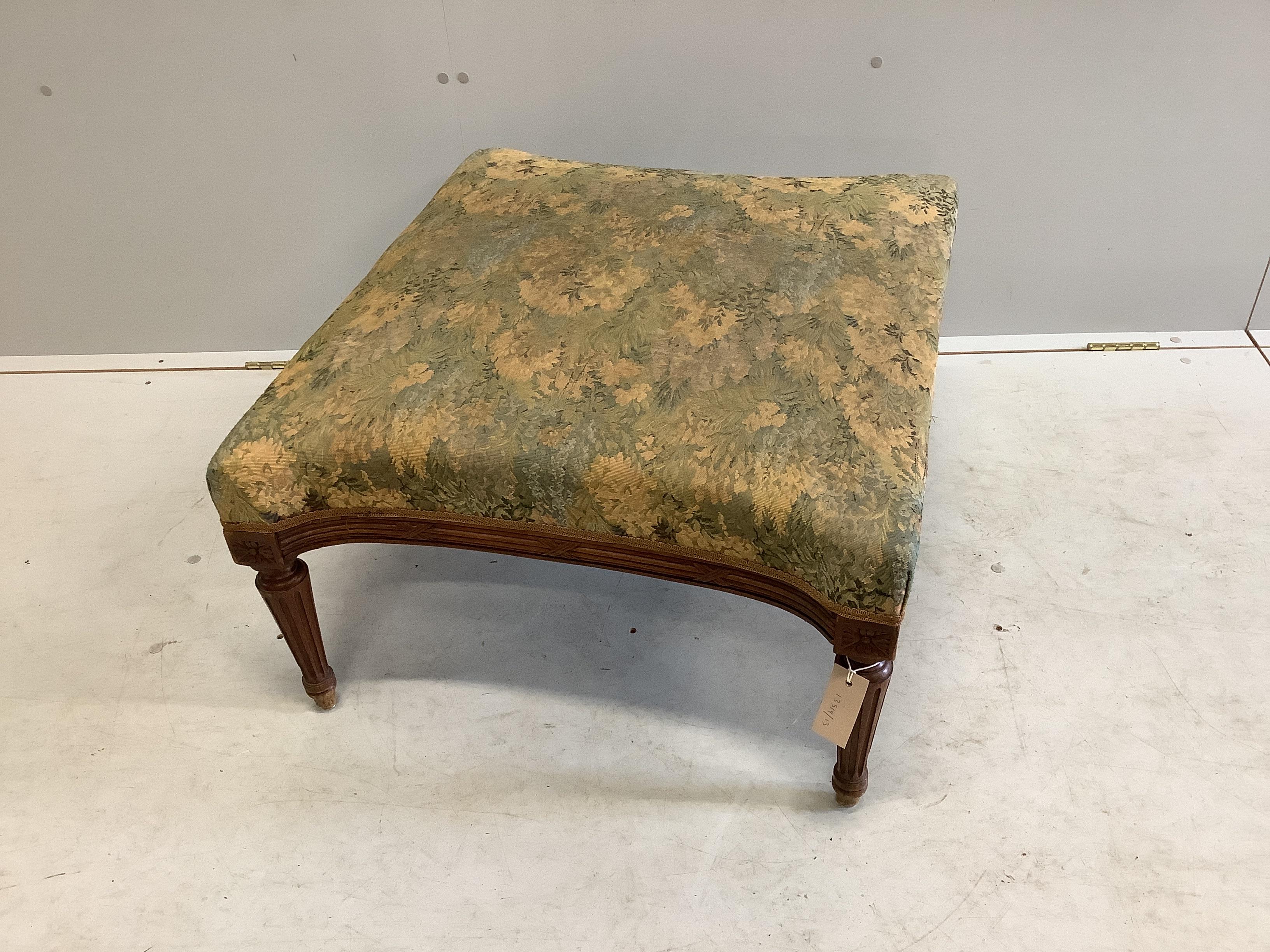 An early 20th century French beech stool with tapestry seat, width 66cm, height 38cm